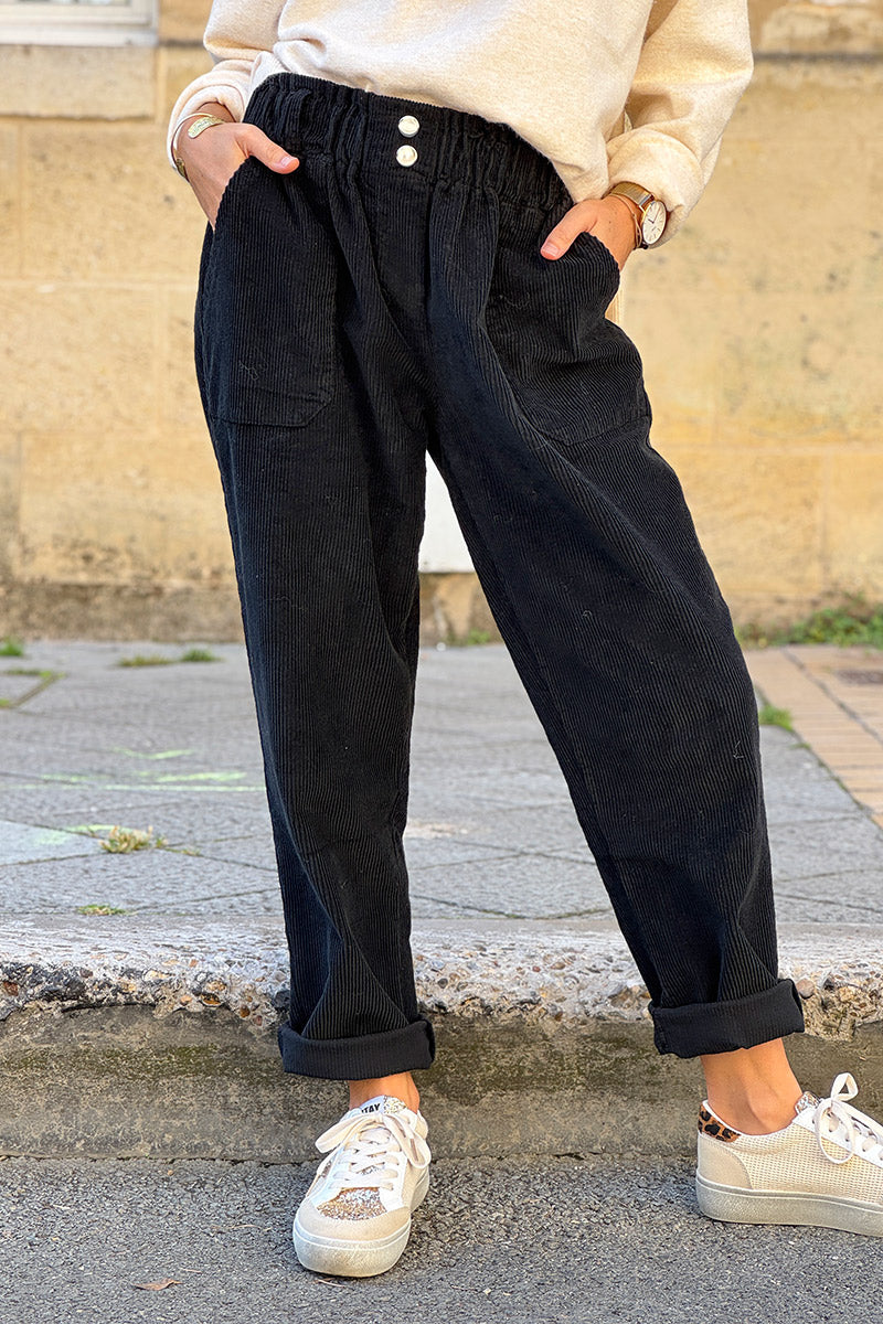 Pantalon noir en velours côtelé coupe paperbag ceinture élastique