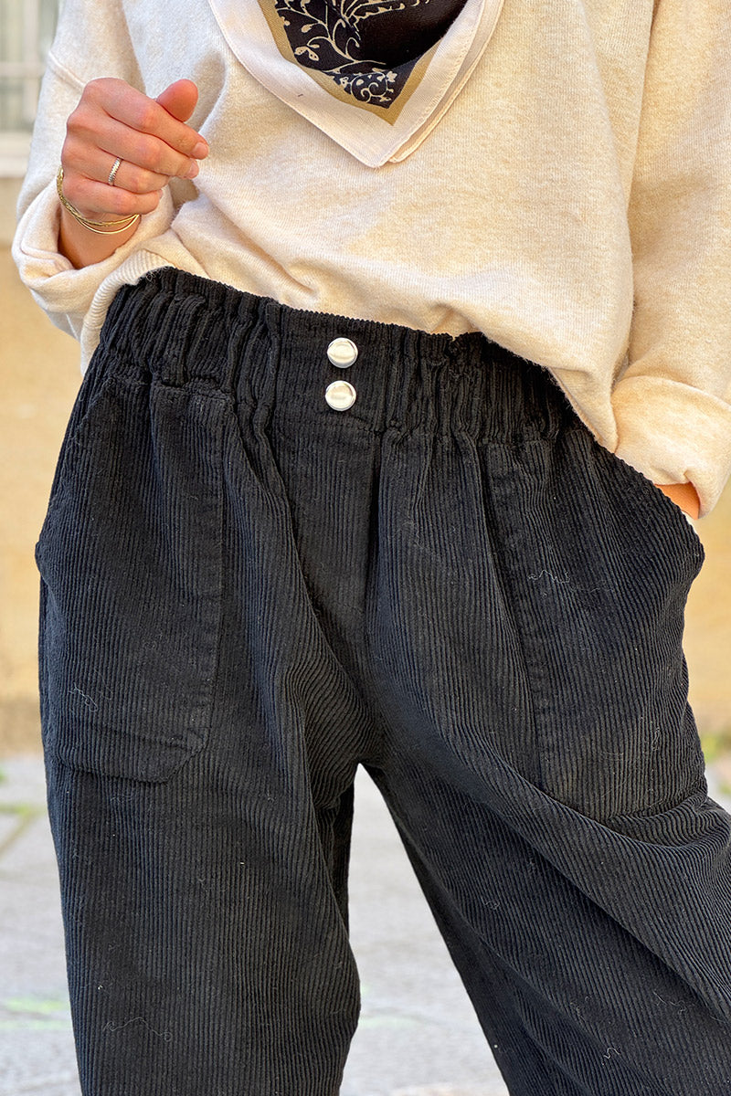 Pantalon noir en velours côtelé coupe paperbag ceinture élastique