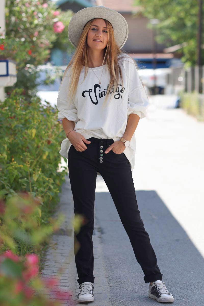 Pantalon noir matière toile de jean noire boutons originaux pierre verte E148