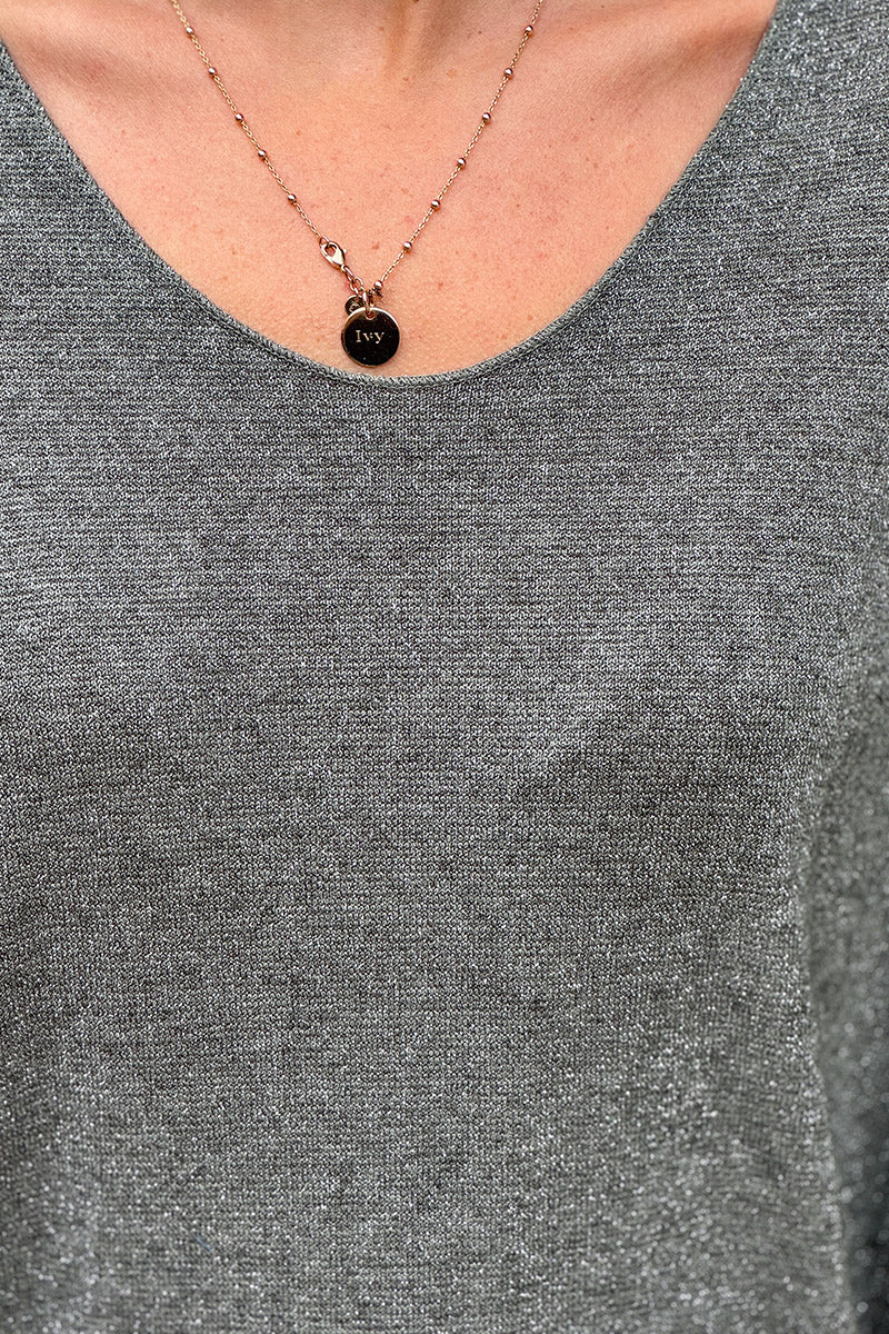 Petit pull large kaki maille lurex brillante col v