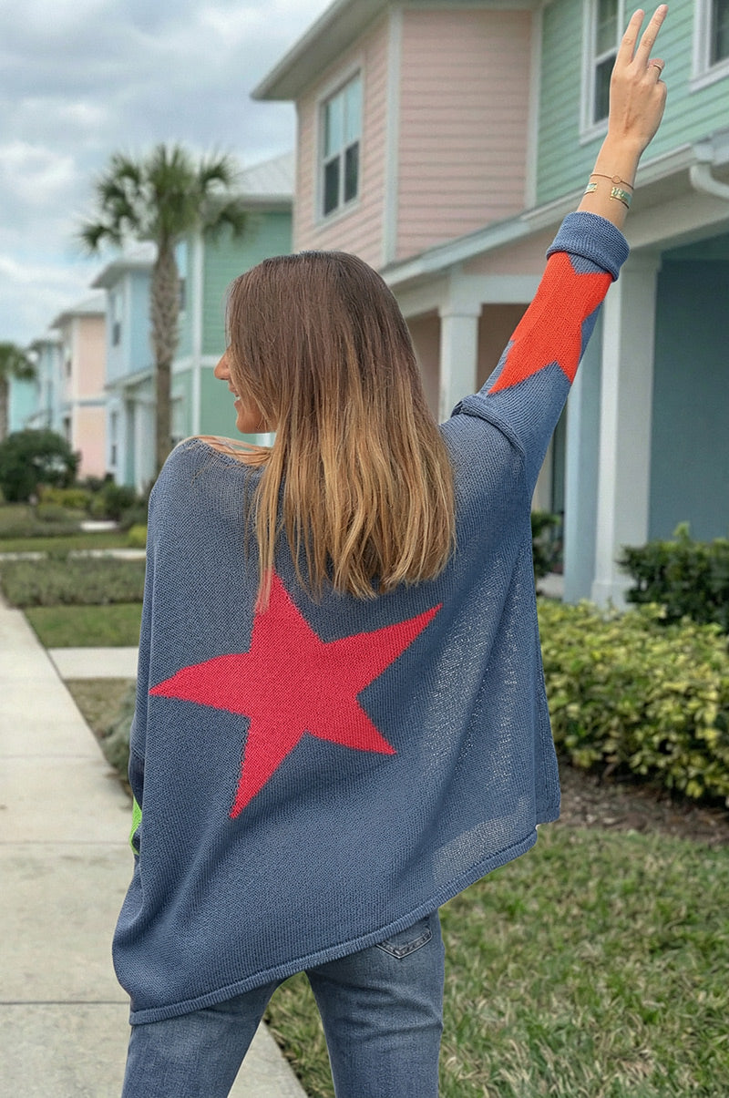 Jersey de punto de algodón denim azul con estrellas de colores en espalda y mangas