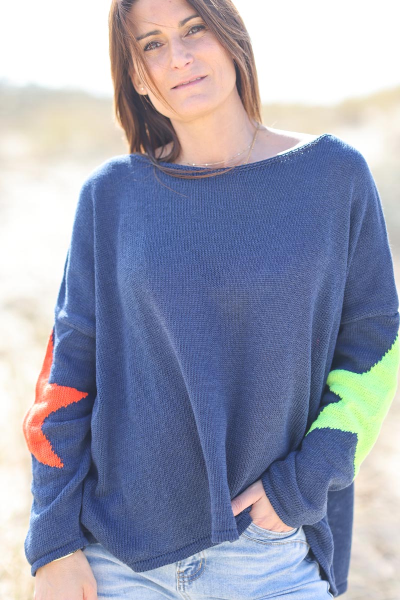 Navy blue knit sweater with colourful stars
