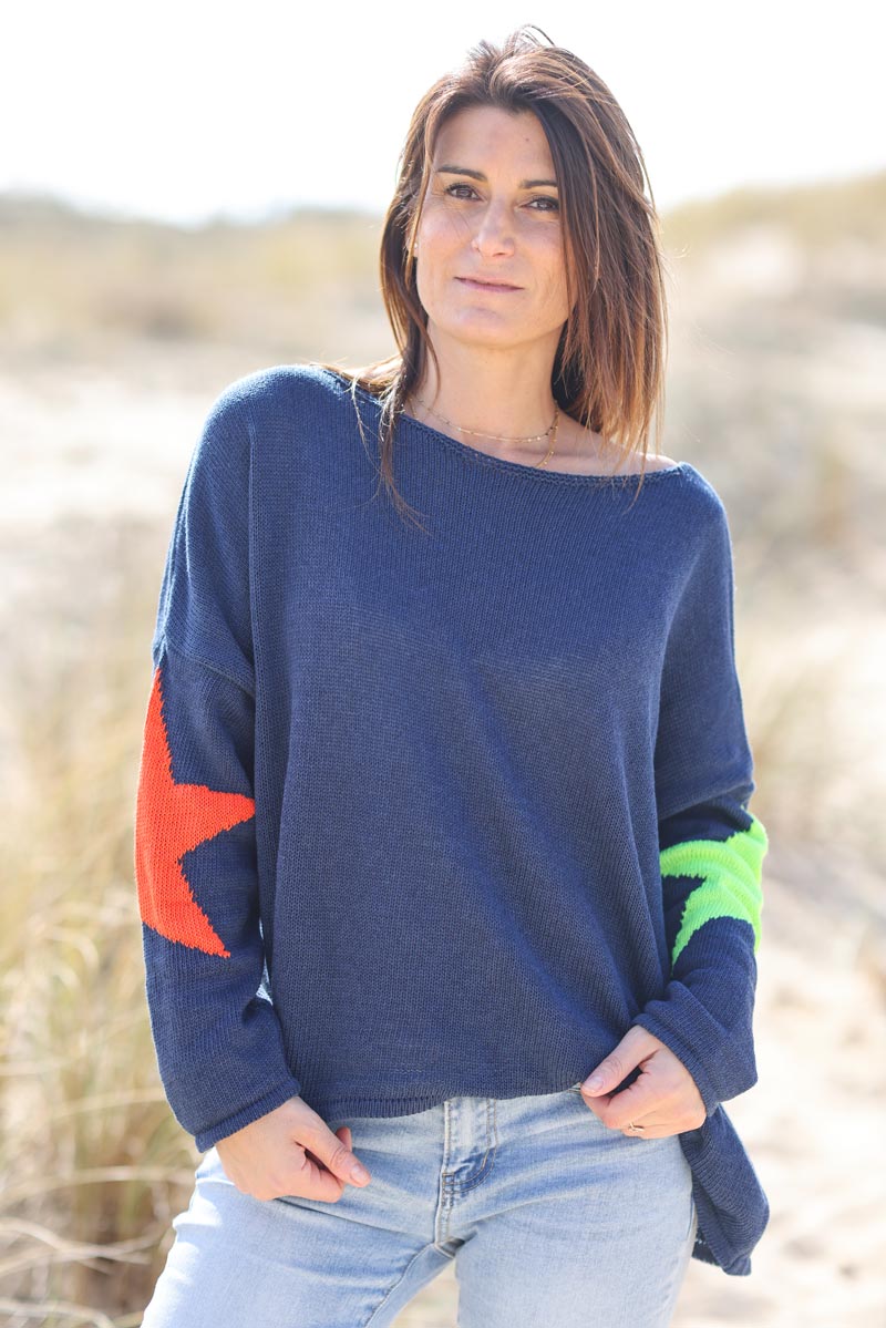 Navy blue knit sweater with colourful stars