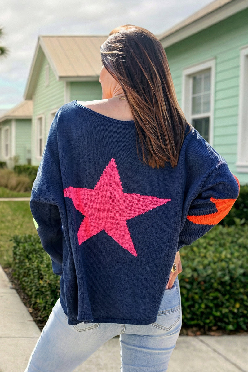Navy blue knit sweater with colourful stars