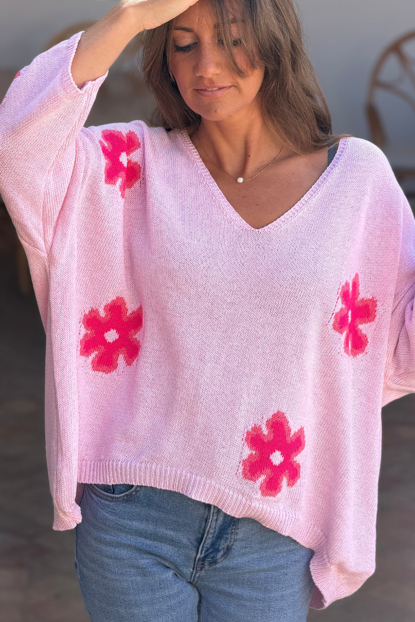 Pull en maille coton rose motif fleurs marguerites dégradées fuchsia
