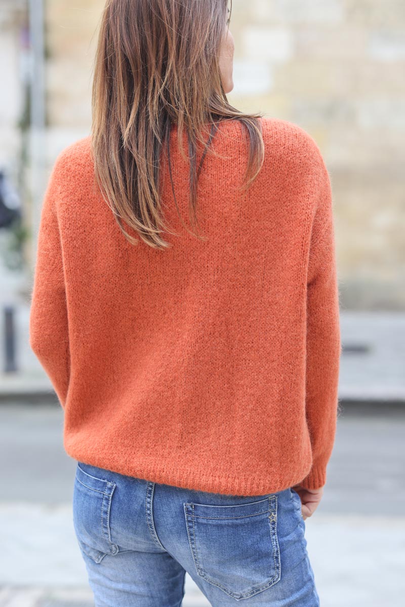 Pull en maille terracotta col v ajouré