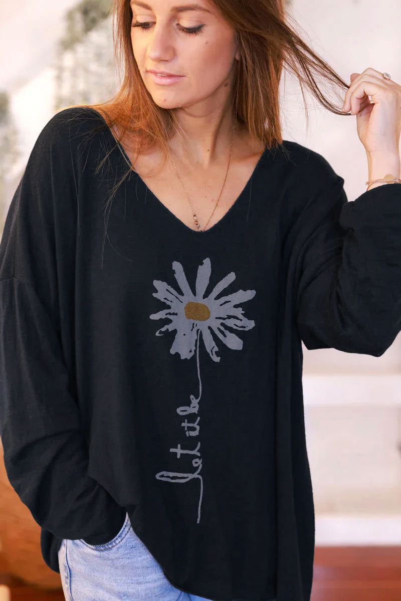 Pull jersey tout doux noir motif marguerite Let it be
