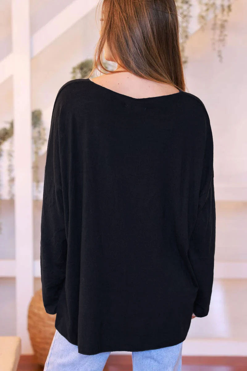 Pull jersey tout doux noir motif marguerite Let it be