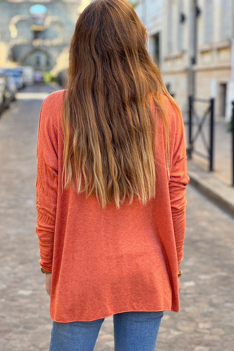 Pull jersey tout doux orange motif marguerite Let it be