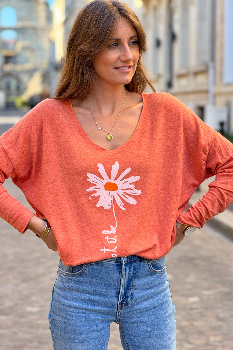 Pull jersey tout doux orange motif marguerite Let it be