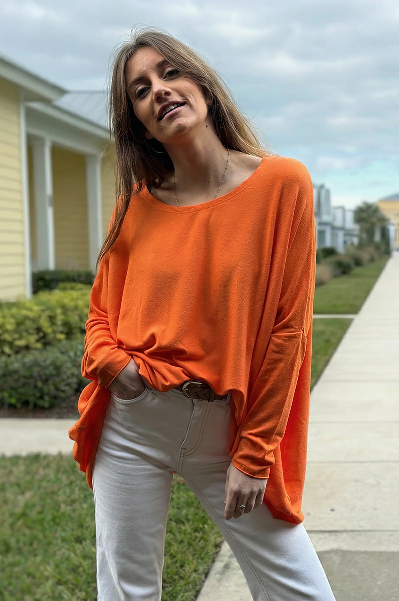 Pull large orange manches chauve souris