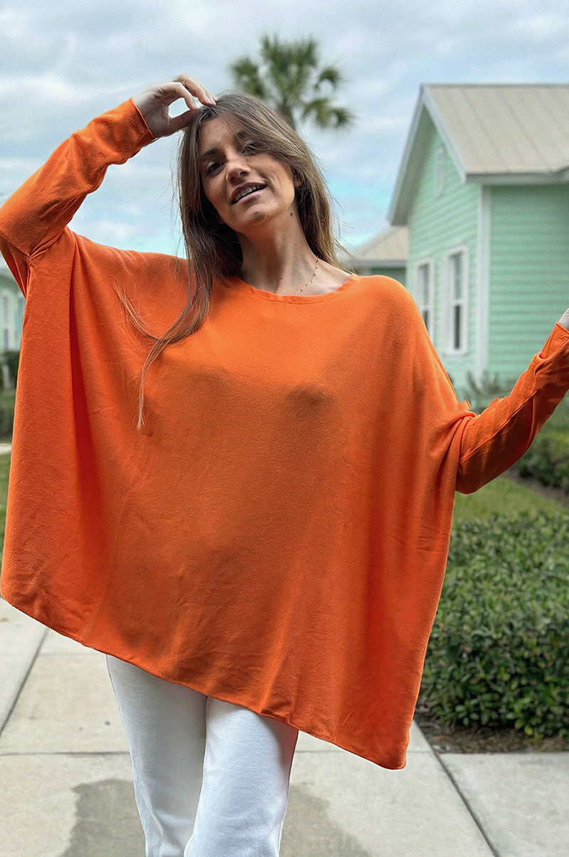 Pull large orange manches chauve souris