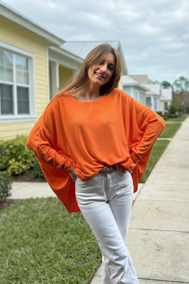 Pull large orange manches chauve souris