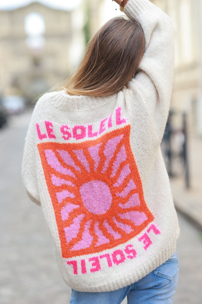 Beige chunky knit sweater with vibrant sun embroidery