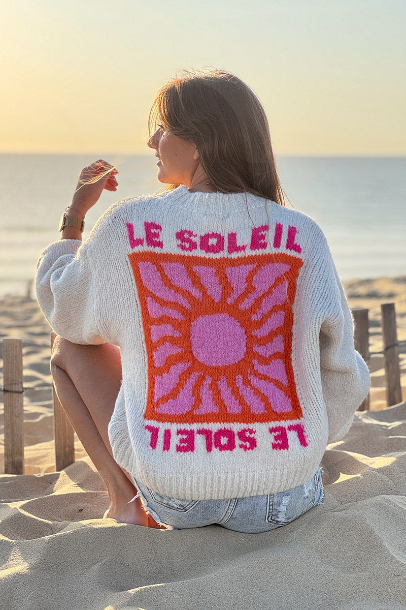 Beige chunky knit sweater with vibrant sun embroidery
