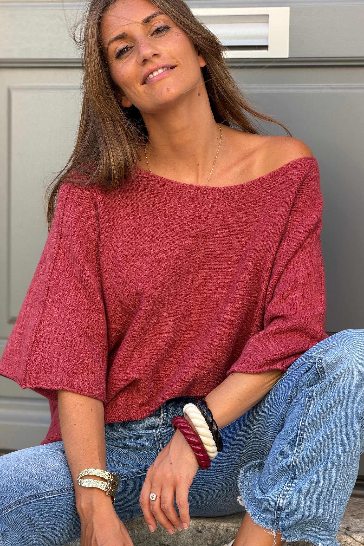 Pull moelleux et doux bois de rose à manches chauve-souris col rond