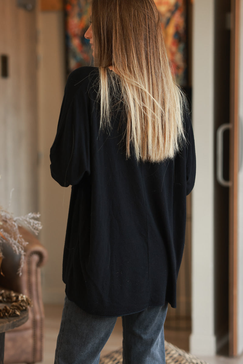 Pull noir jersey doux rock and roll relief éponge