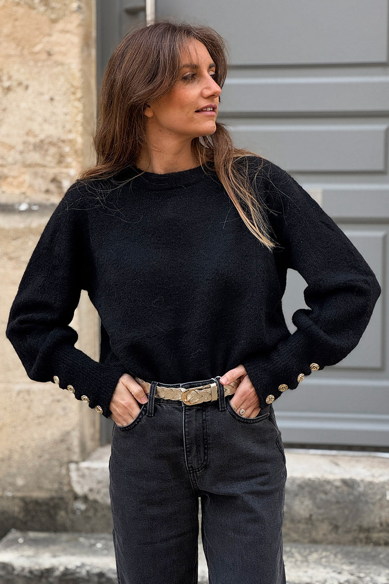 Pull noir moelleux col rond côtelé manches resserrées détails boutons dorés