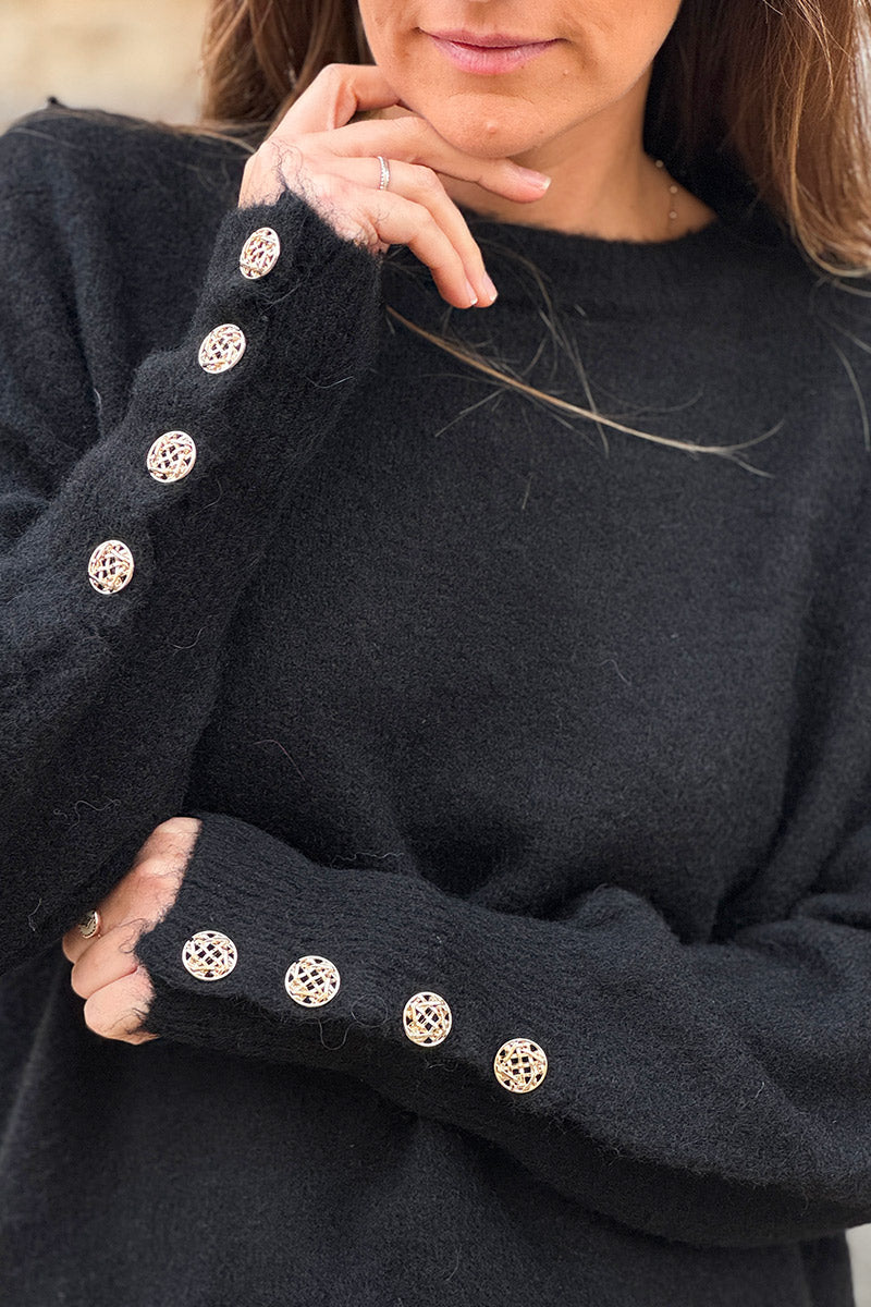 Pull noir moelleux col rond côtelé manches resserrées détails boutons dorés