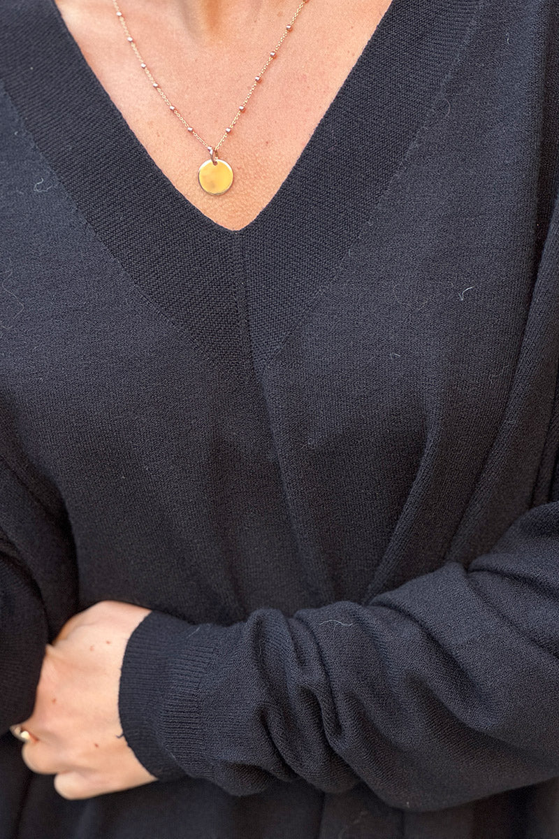 Pull large et doux noir col v côtelé