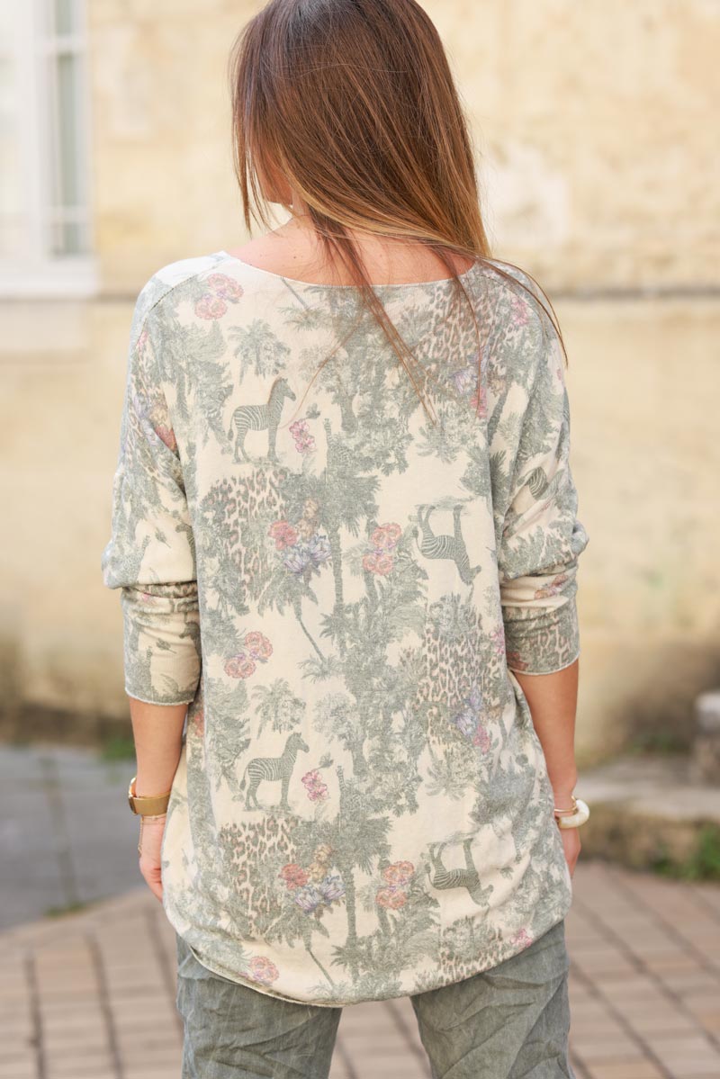 Soft olive v-neck sweater with jungle-inspired toile de Jouy print