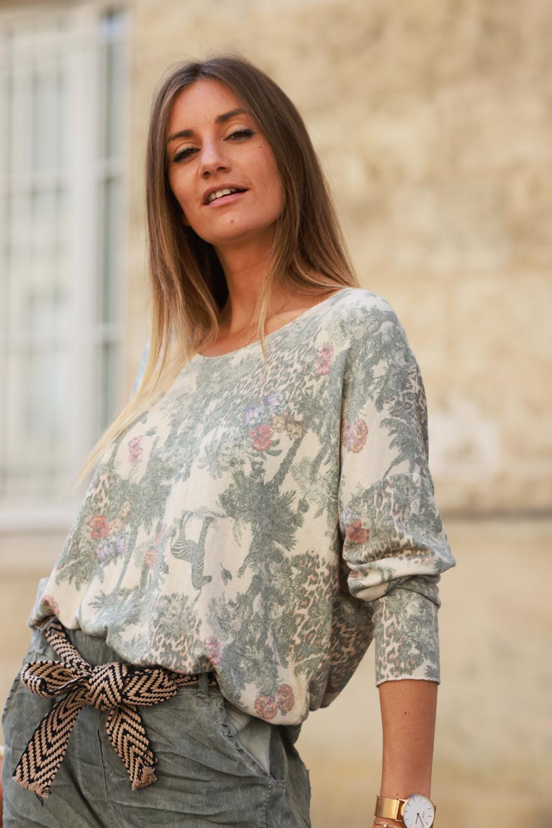 Soft olive v-neck sweater with jungle-inspired toile de Jouy print