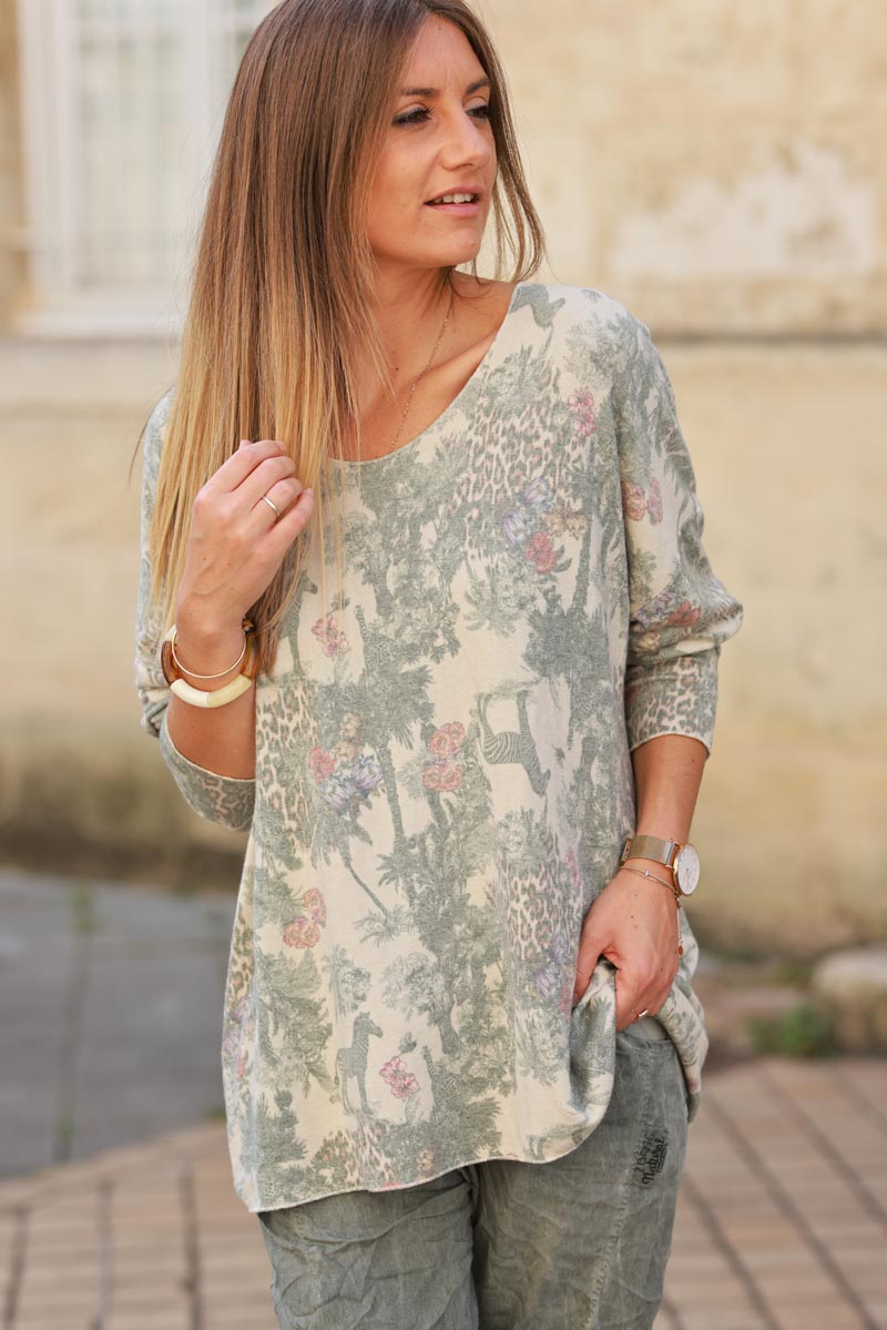 Soft olive v-neck sweater with jungle-inspired toile de Jouy print