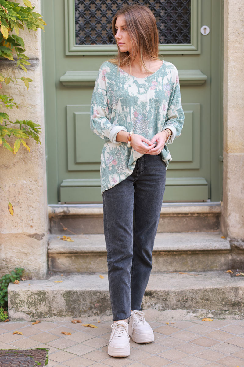 Soft Celadon green v-neck jumper with jungle-inspired toile de Jouy print