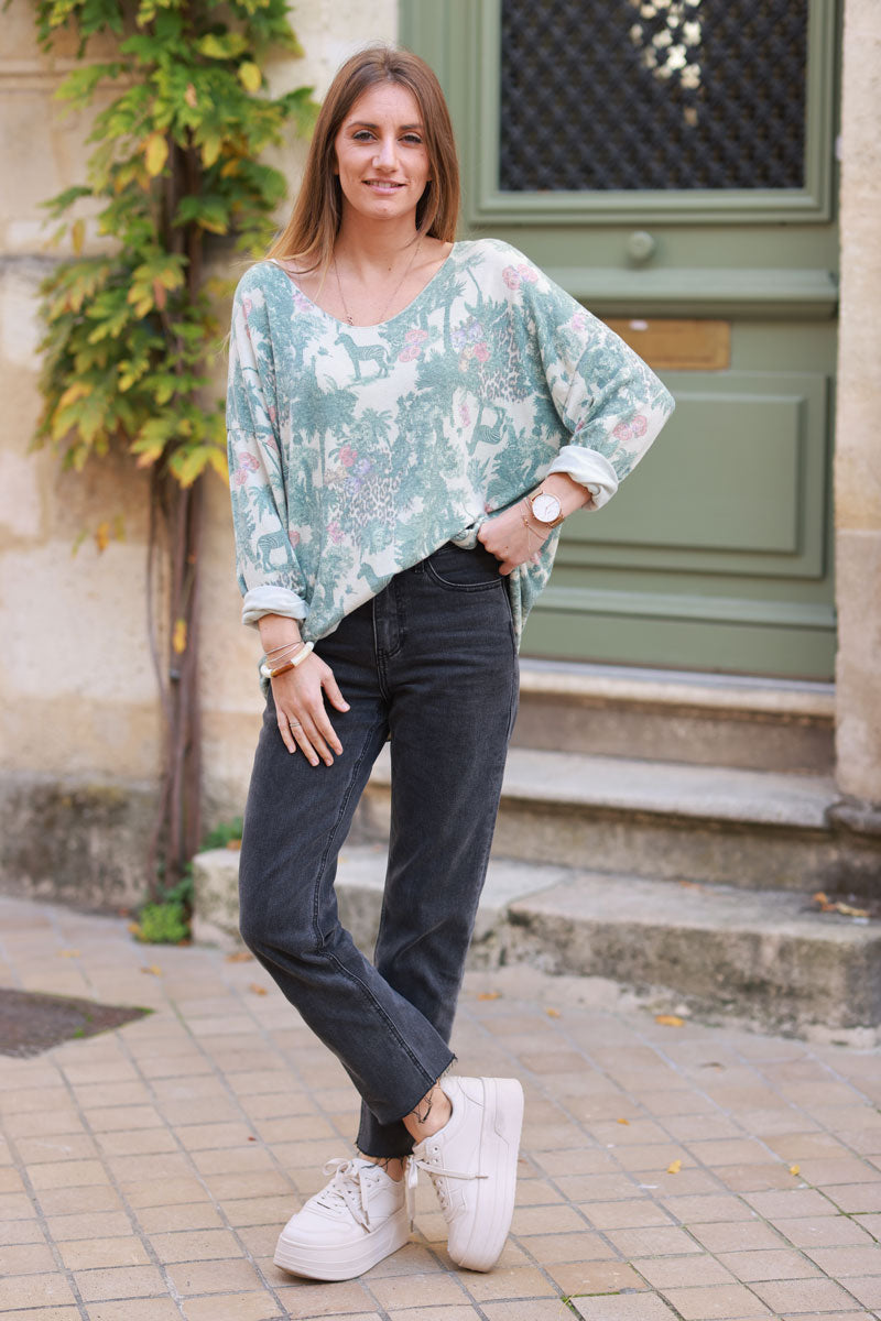 Soft Celadon green v-neck jumper with jungle-inspired toile de Jouy print