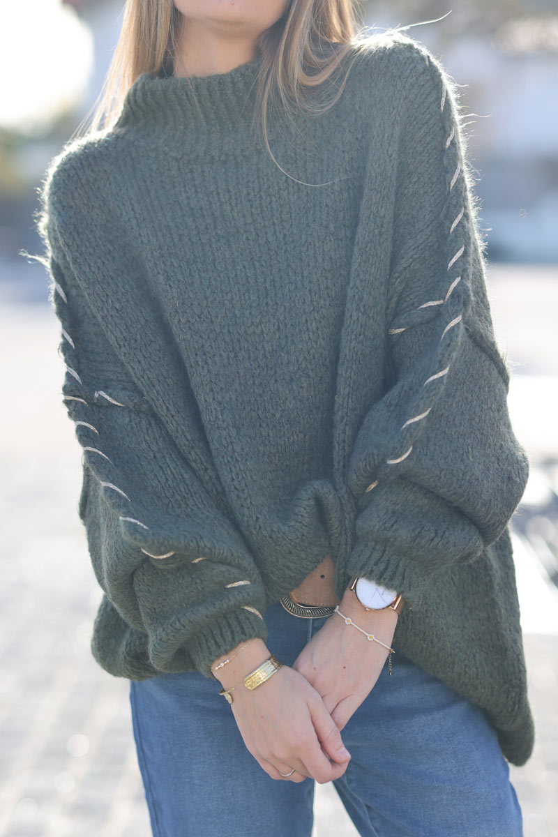 Oversized chunky knit sweater in khaki with gold seam stitching detail