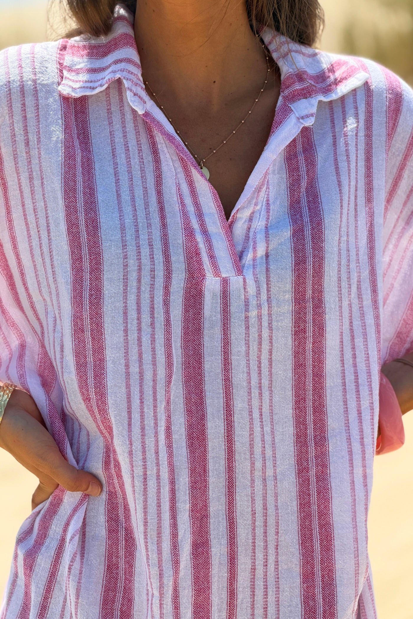 Robe en coton motif rayures roses effet pique col v