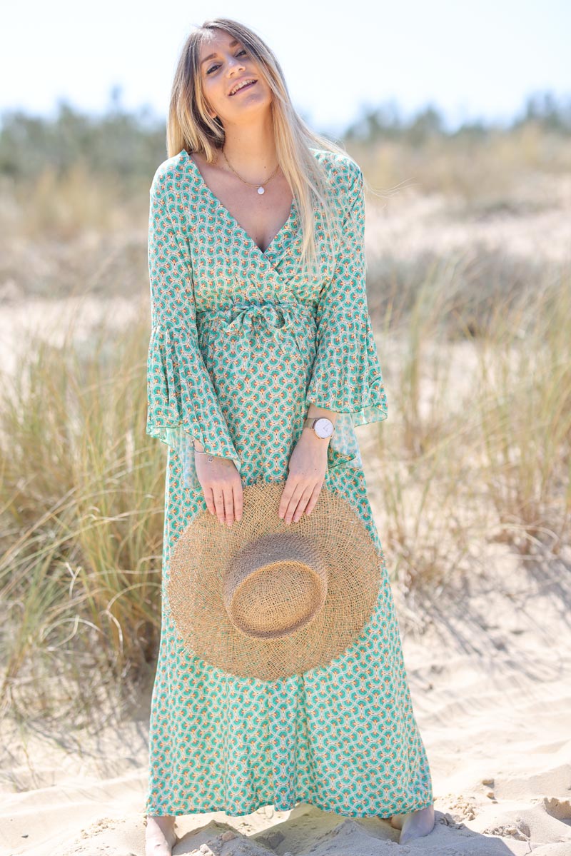 Green long flowing dress with heart wrap and flared sleeves in peacock