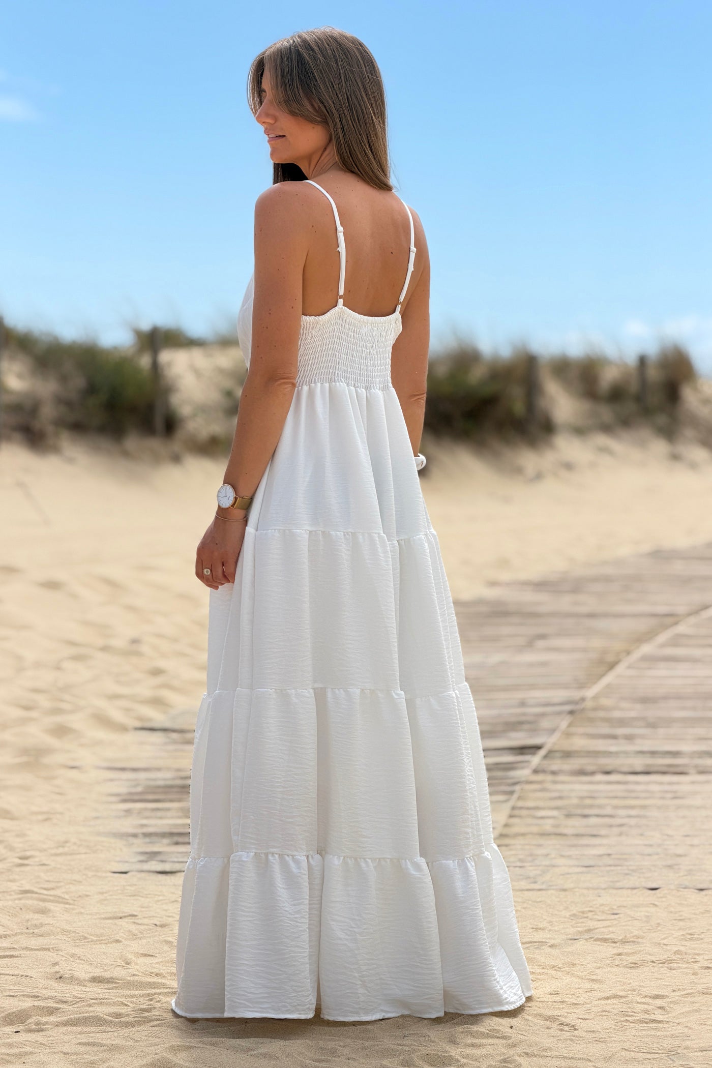 White Tiered Goddess Maxi Dress with Golden Sun Brooch