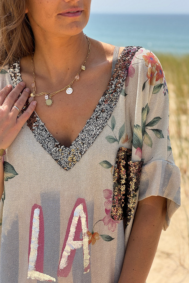 Robe longue brillante motif fleurs et la Dolce Vita rose poche et col sequins