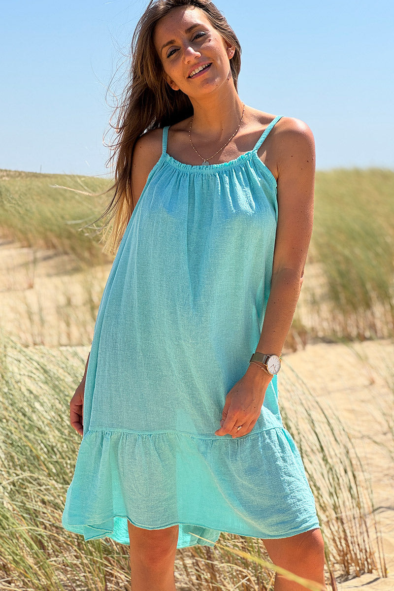Robe turquoise à bretelles en coton col élastique bas volants