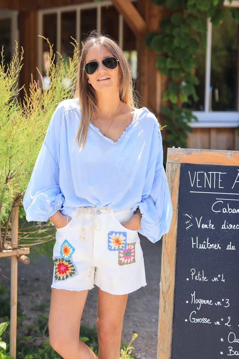 Off-white shorts with colourful crochet embroidery