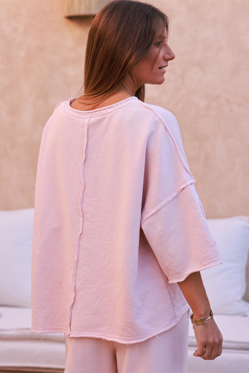 Sweat confort rose pâle manches 3/4 loose détails effilochés coutures apparentes