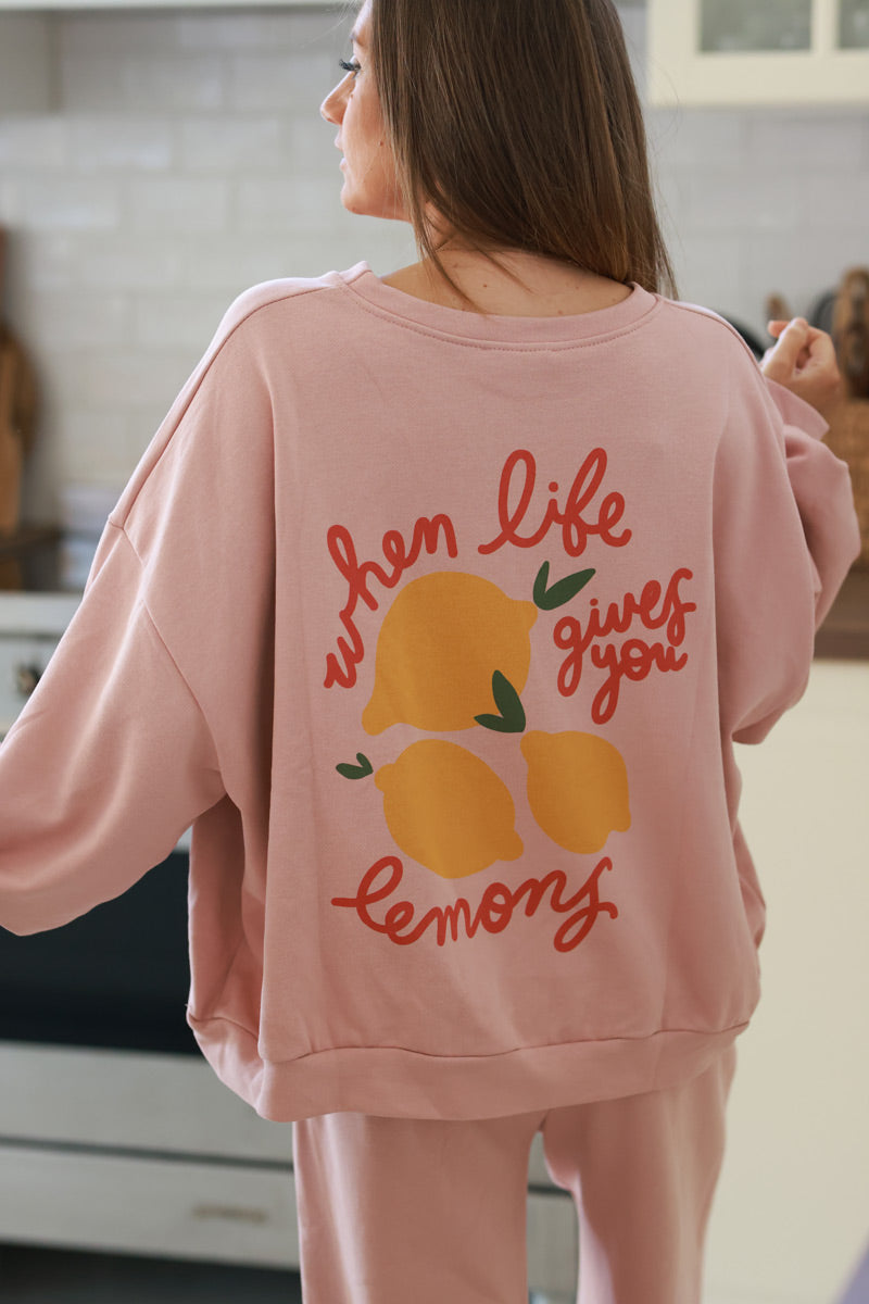 Sweat rose pâle large et confort motif citrons lemons délavé