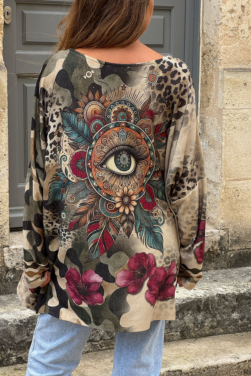 Top brillant beige large à manches longues imprimé camo village léopard et œil