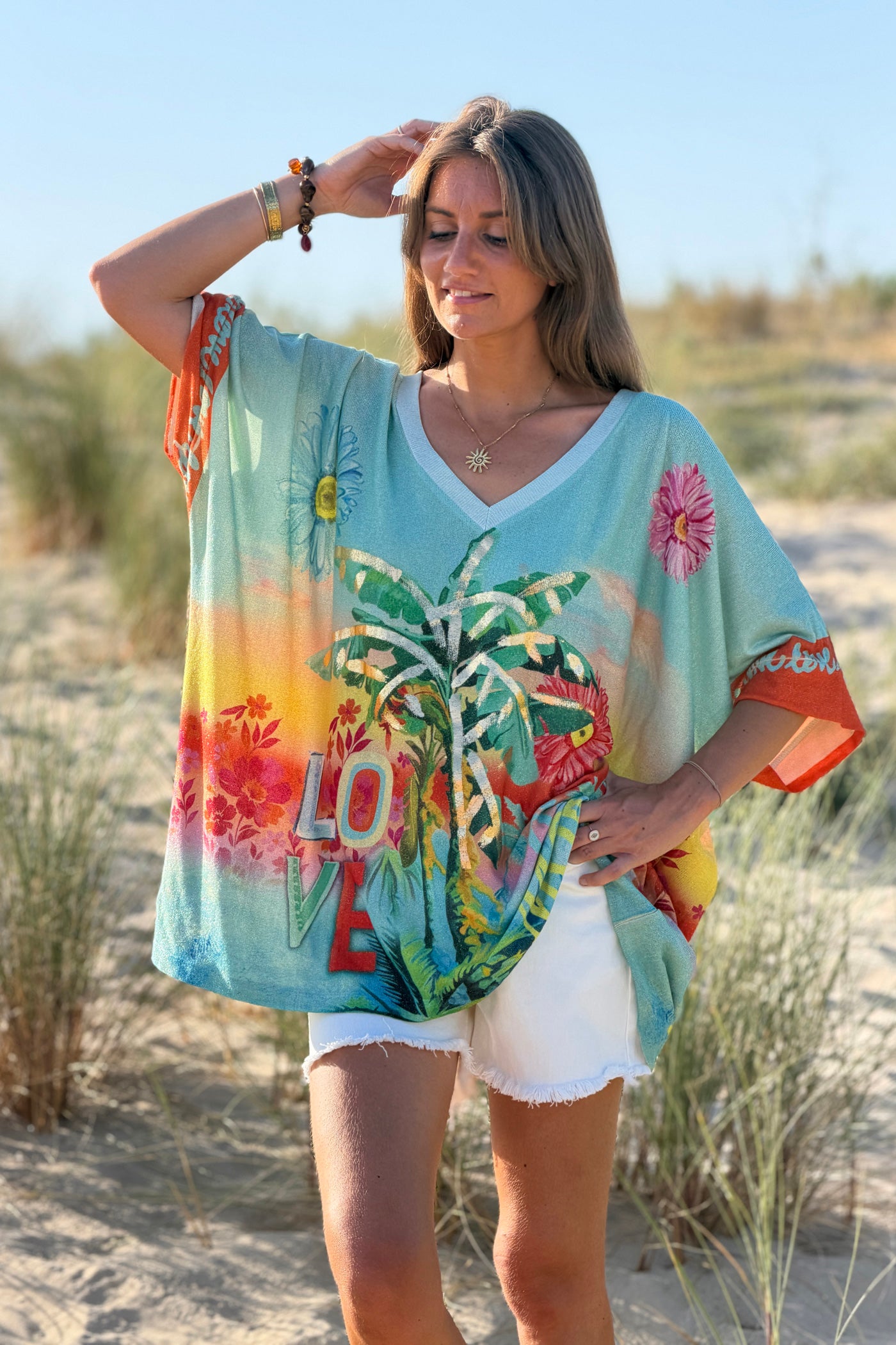 Top large turquoise brillant lurex imprimé tropical palmiers