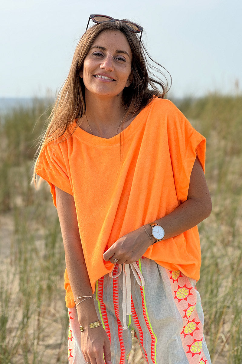 Top loose orange fluo en éponge souple
