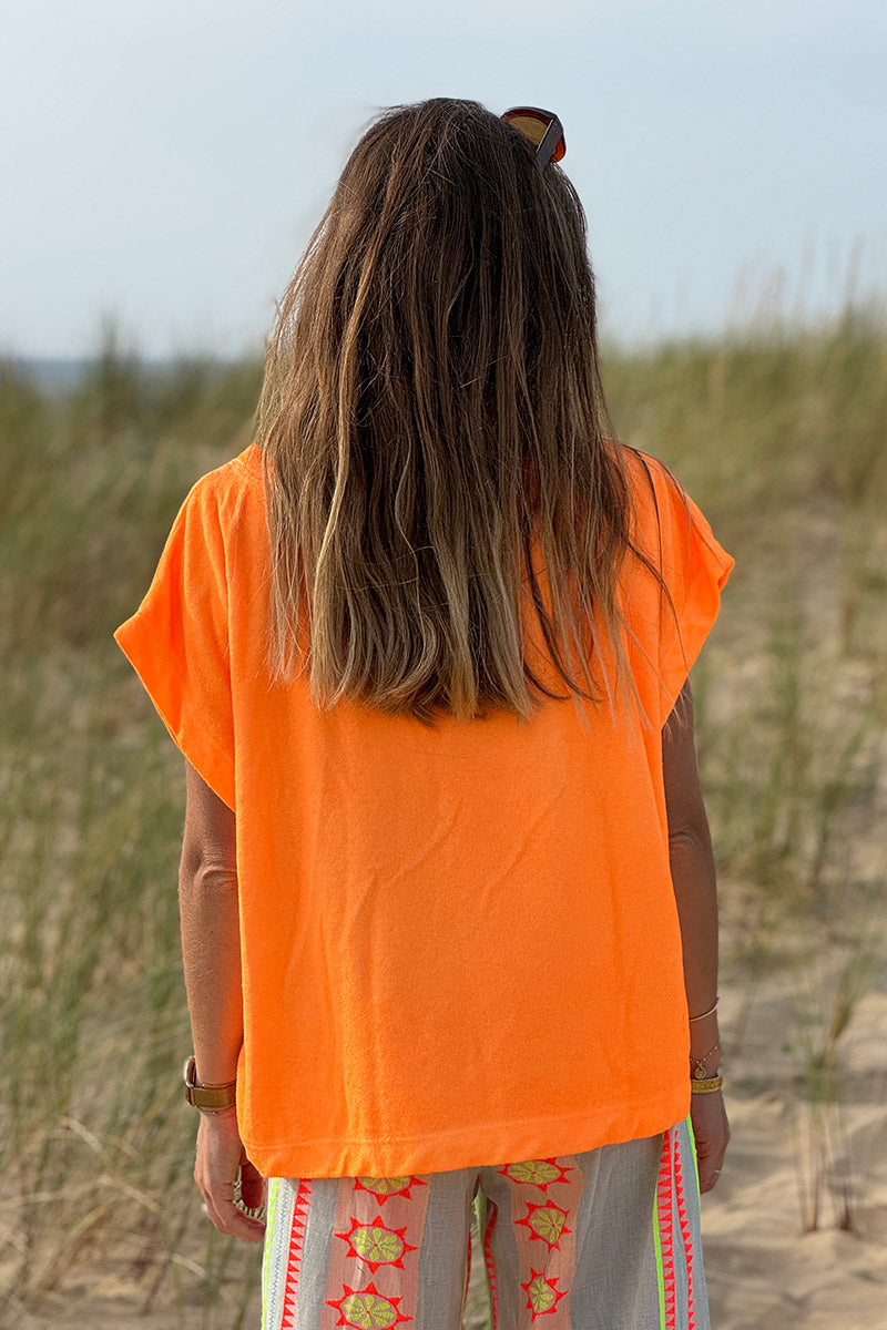 Top loose orange fluo en éponge souple