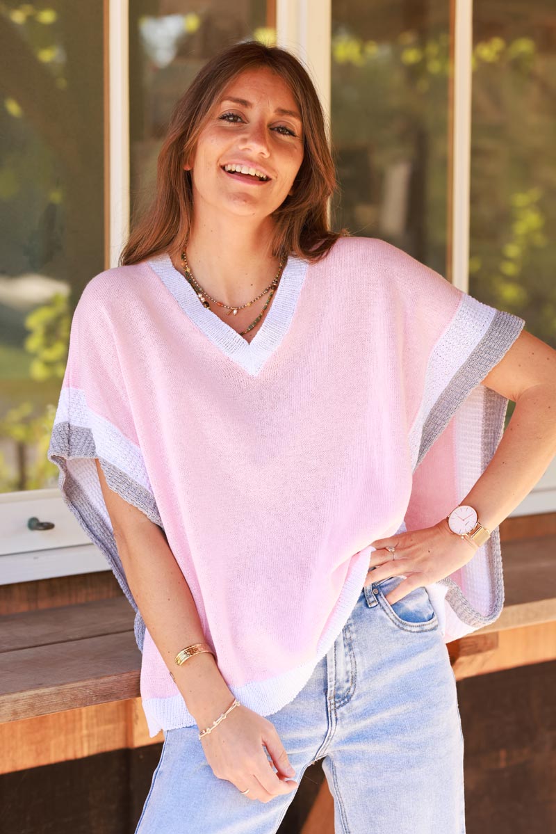 Top loose rose pâle en maille coton ouvert aux manches