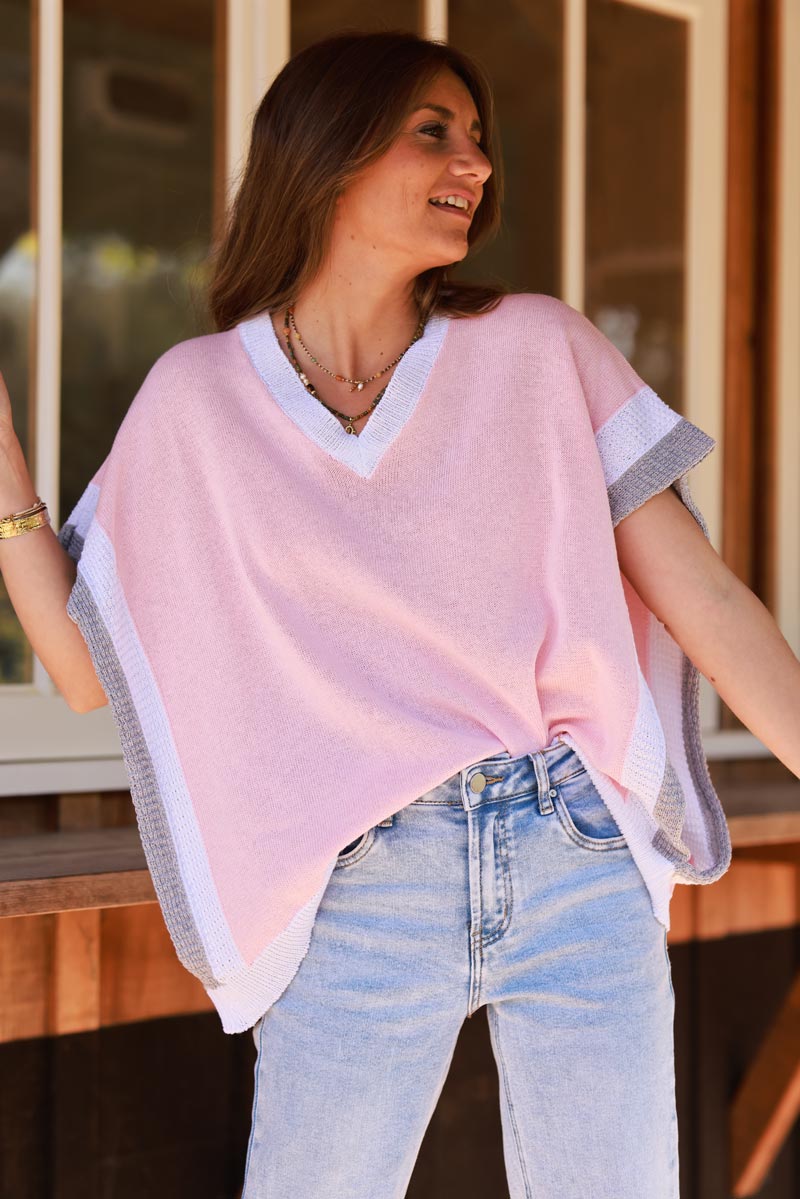 Top loose rose pâle en maille coton ouvert aux manches