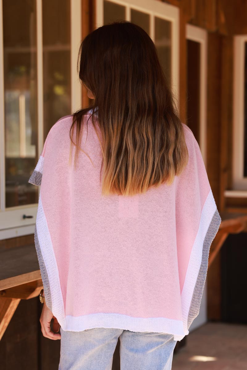 Top loose rose pâle en maille coton ouvert aux manches