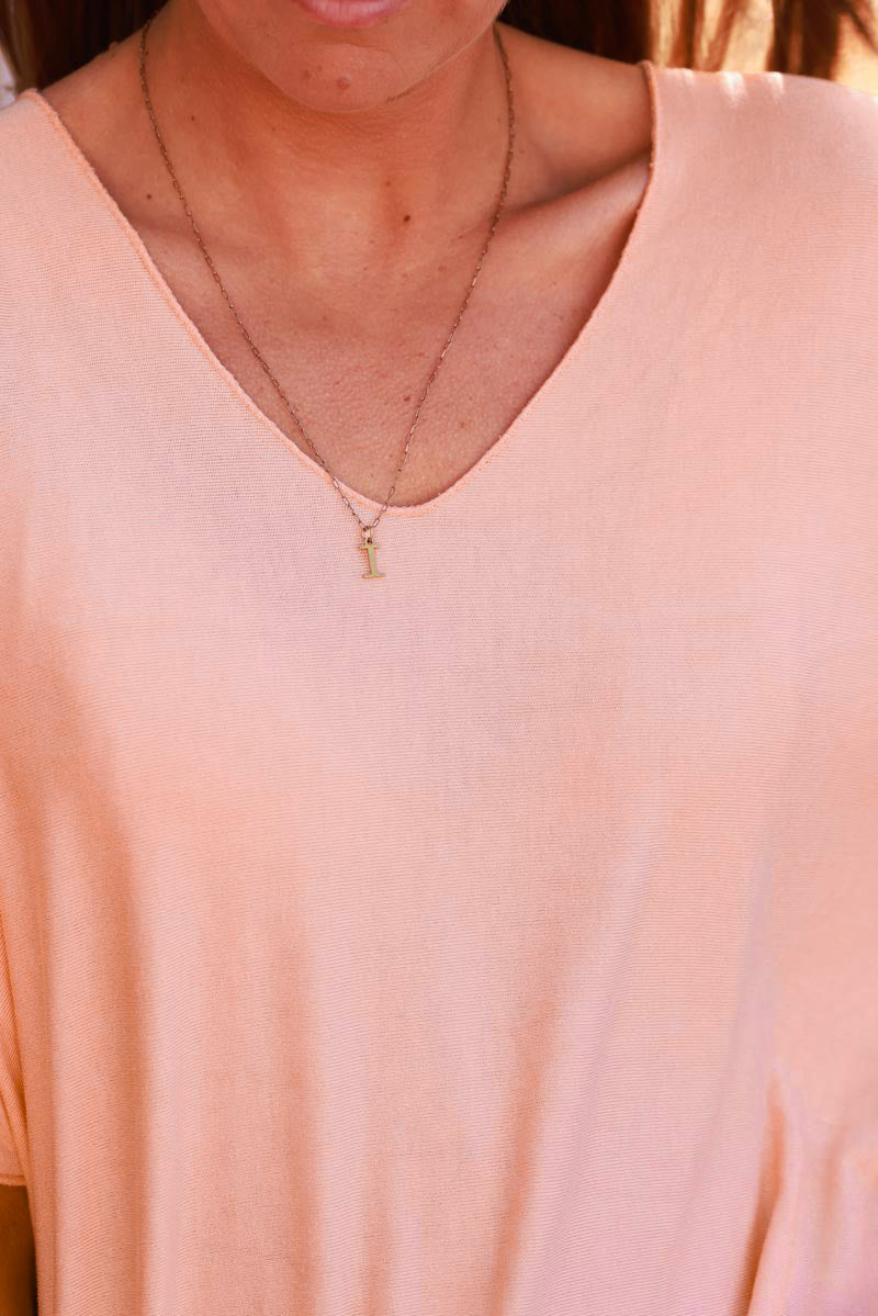 Top orange pastel fluide confort et stretch col v