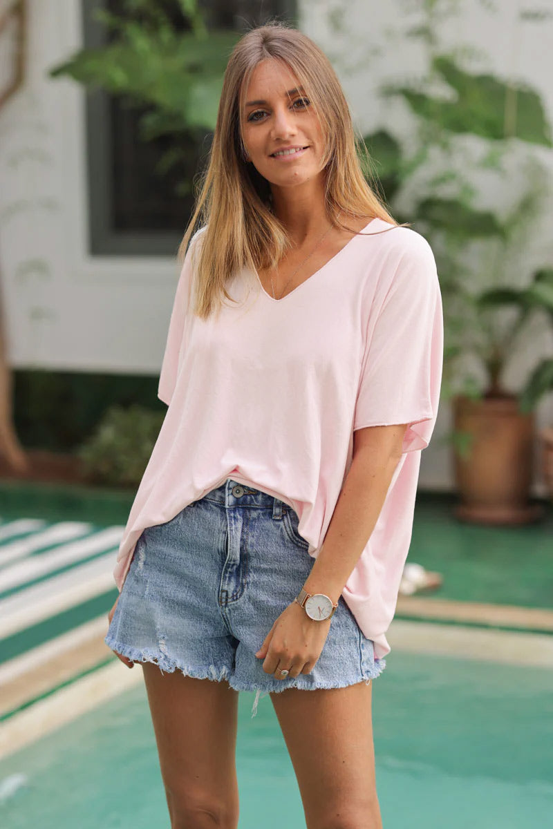 Top rose pâle fluide confort et stretch col v