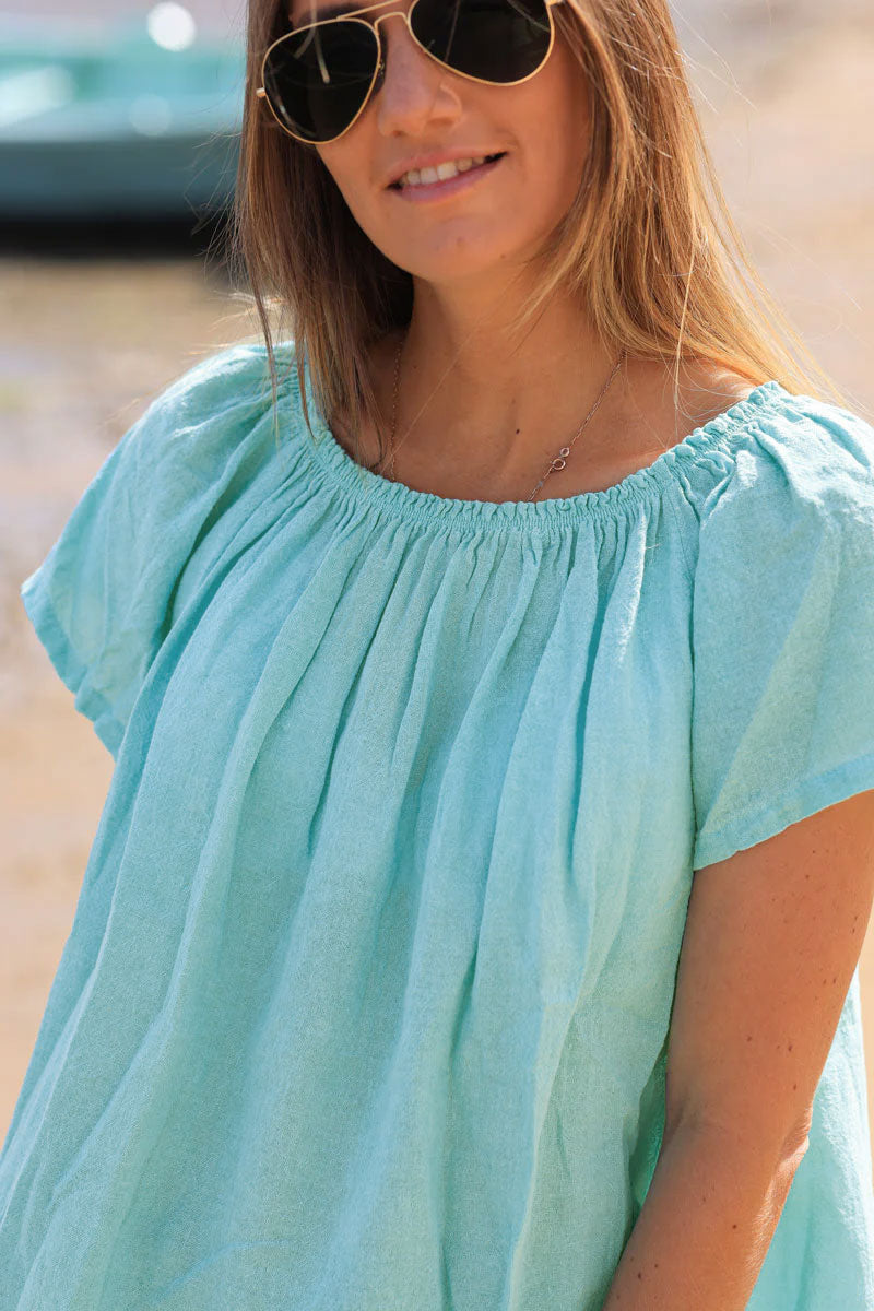 Top turquoise délavé en coton col élastique rond ou bardot