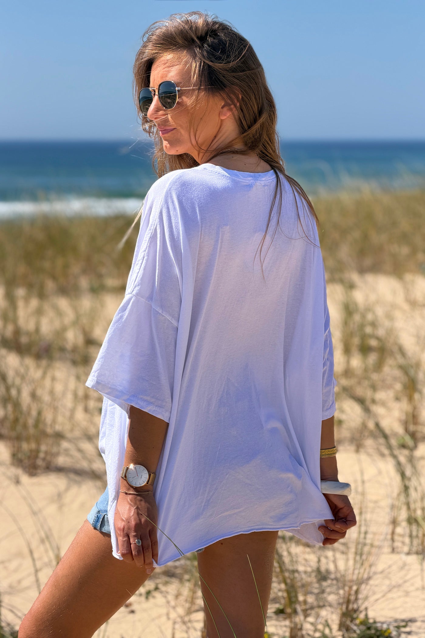 Tshirt large et loose blanc en coton étoile rose follow the light col v
