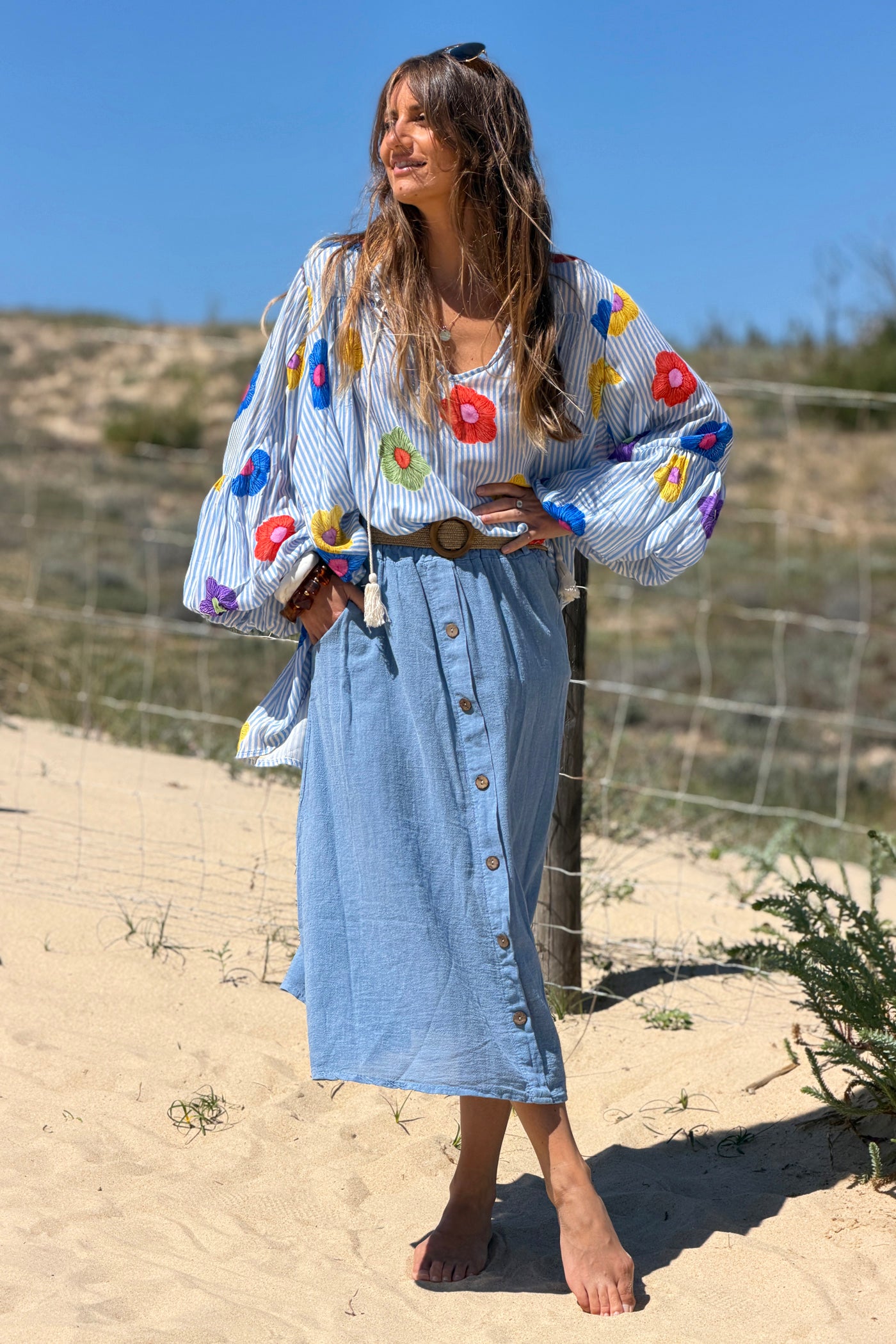Floaty semi-sheer blouse with blue stripes and colourful flower print